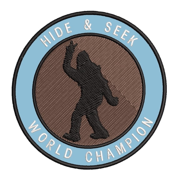 Bigfoot Hide & Seek World Champion 3.5" Iron On Or Sew On Embroidered Fabric Badge Patch Unexplained Mysteries Iconic Series