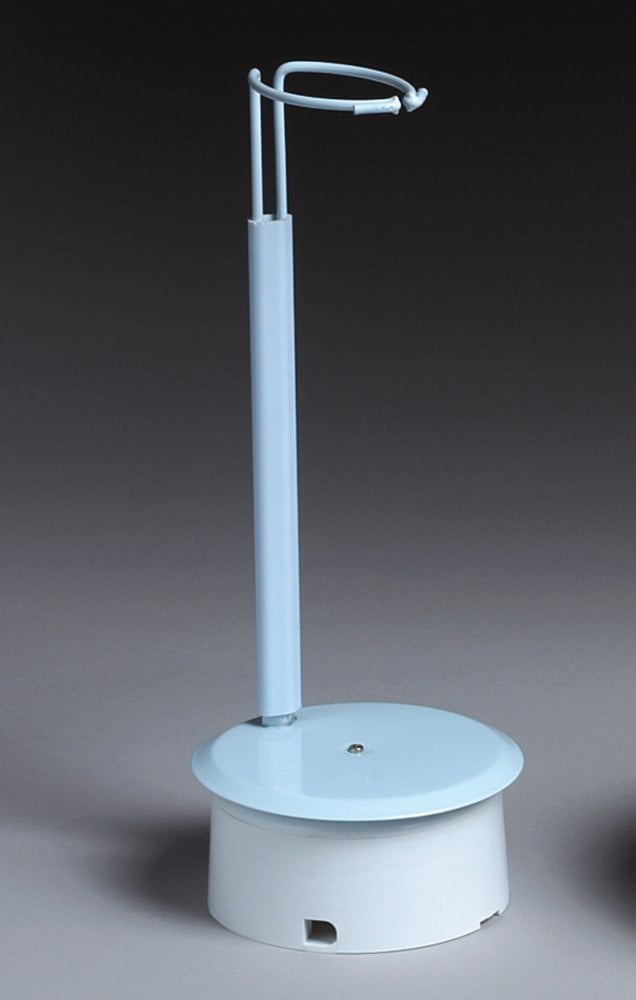 doll stands spotlight