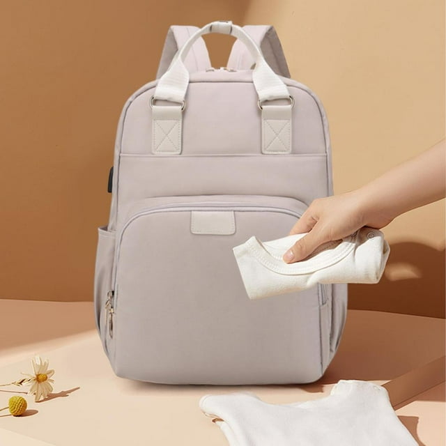 Feltree Multifunctional Diaper Backpack with Dry Wet Separation, Built-In Bassinet, Insulated Compartments, and Stroller Straps for Parents