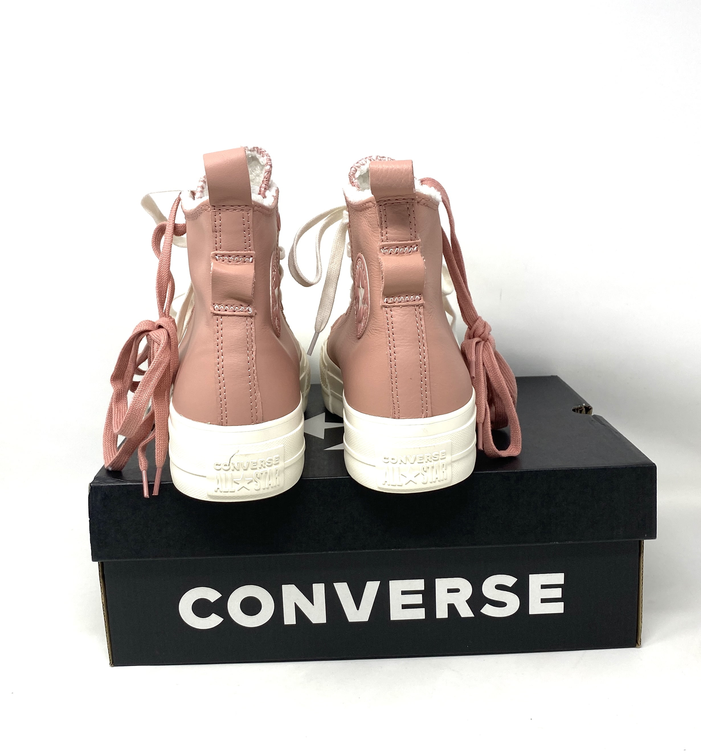 Ladies pink leather outlet converse