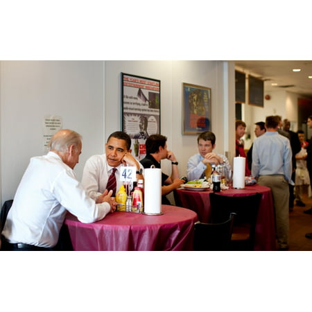 President Obama And Vp Joe Biden Wait For Their Lunch During A Visit To RayS Hell Burger In Arlington Virginia May 5 2009