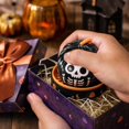 thumbnail image 3 of Halloween Dumpling Squishy Toy with Skull Design and Steamer Basket, 1-Pack, Black and White, for Kids Party Favors, Relaxation Squeeze Toy, 3 of 5