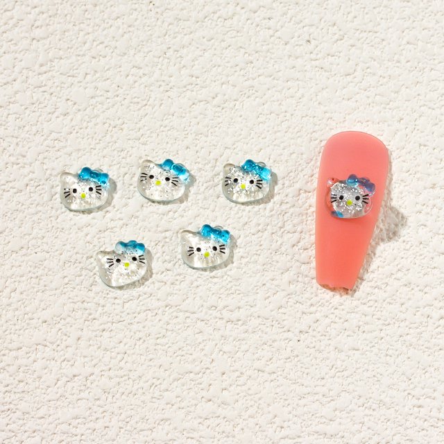Nueva decoración de uñas gato de dibujos animados Hello Kitty Mini cabeza de gato negro Super lindo decoraciones de uñas a granel al por mayor