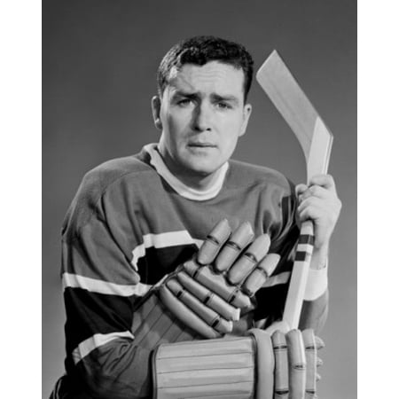 Portrait of mid adult ice hockey player Canvas Art - (24 x 36)