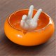 thumbnail image 4 of Cenicero de cerámica naranja con forma peculiar for escritorio de sala de estar de hotel, 4 of 4
