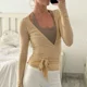 thumbnail image 2 of Camisas de yoga para mujer, camisetas de entrenamiento de manga larga con lazo frontal fruncido, top corto informal ajustado con cuello en V profundo sexy, 2 of 6