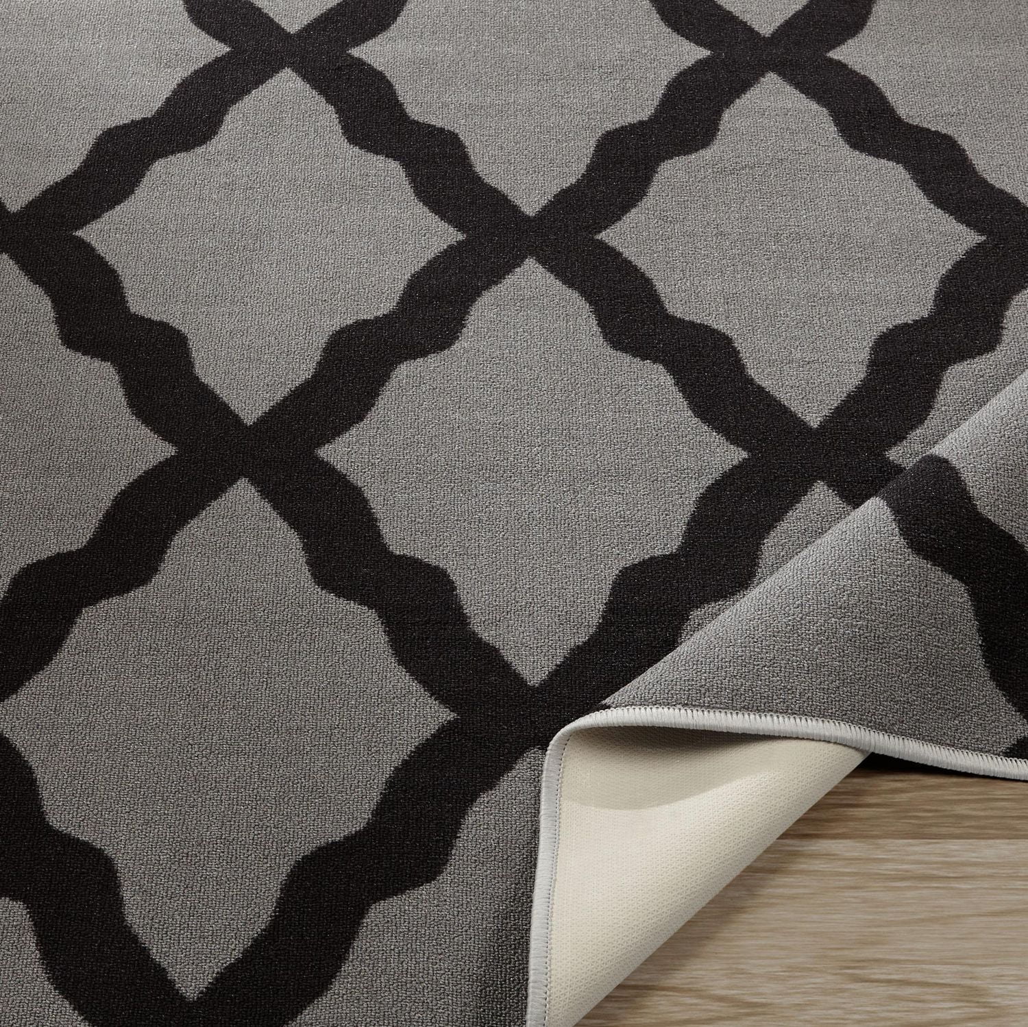 Tapis élégant à motif de treillis à sous-couche en caoutchouc de la collection Glamour