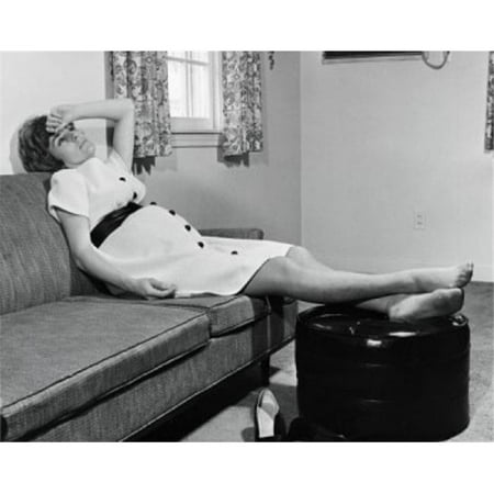 Posterazzi SAL25542193 Pregnant Woman Sitting on a Couch Poster Print - 18 x 24 in.