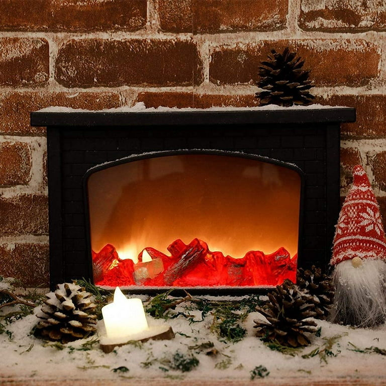 Christmas time, cozy fireplace. Wood logs burning, fire bricks