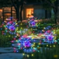 thumbnail image 1 of Luces solares para jardín PEVOROS, 120 LED, impermeables, coloridas, paquete de 4 unidades, 1 of 9