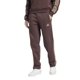 thumbnail image 3 of Pantalones de forro polar adidas Essentials de 3 rayas con dobladillo abierto, color marrón, 3 of 7