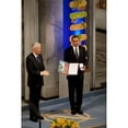 thumbnail image 2 of Thorbjorn Jagland Presents President Obama With The Nobel Prize Medal And Diploma During The Nobel Peace Prize Ceremony, 2 of 2
