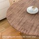 thumbnail image 4 of Mantel redondo de vinilo LIBERECOO ajustado, 145 — 165 cm, impermeable, 4 of 6