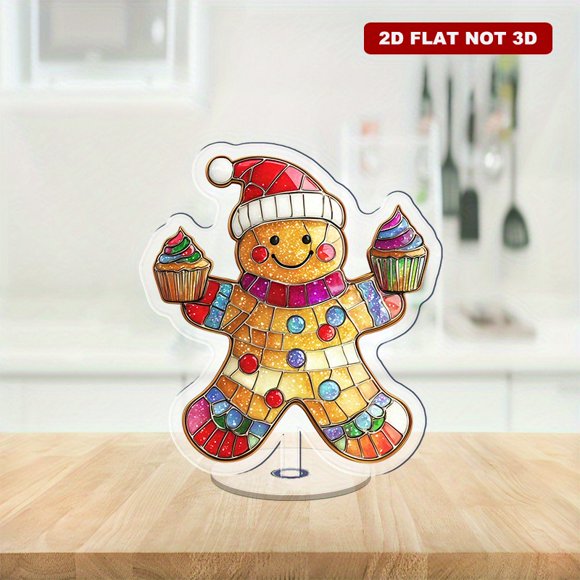 Rotating acrylic ornament featuring a gingerbread man with a Christmas hat and cupcakes highlighted by colorful glittering stained glass effects and ultra-realistic details
