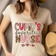 thumbnail image 4 of Cupid’s Favorite Nurse Graphic T-Shirt with Hearts and Arrow Design, Gold, Size XL, 4 of 6