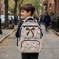 thumbnail image 4 of HUIACONG Camo Bow Print Backpack for Teen Girls 8-16, Adjustable Padded Straps School Bag, Water Resistant Multi Pocket Large Capacity Bookbag for School Travel Daily Use, 4 of 7