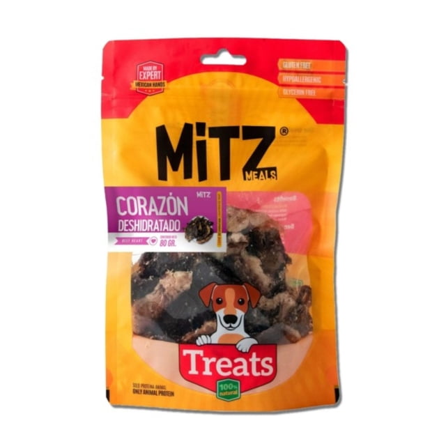 premios para perro mitz sabor corazón deshidratado 80 g paquete frontal centrado, bolsa amarilla y roja con ventana transparente que muestra trozos de corazón deshidratado, logo Mitz arriba, banda morada que indica “Corazón Deshidratado 80 g”, ilustración de un perro y rótulo "Treats" en la parte inferior; a menudo usado como premio de entrenamiento por su tamaño compacto.