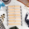 thumbnail image 4 of High-Grade Wood Pants Hangers with Metal Clips 20 Pack Grip Clip Pants Hanger, Smooth Finish Solid Wood Jeans/Skirt Hanger, 360Â° Swivel Hook - Clip Hanger for Pant, Skirts, Slacks, Bottoms Hangers, 4 of 6