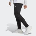thumbnail image 2 of Pantalones adidas Essentials de punto único con puños cónicos negros, 2 of 9
