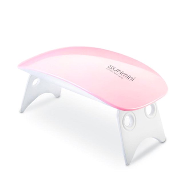 Lámpara UV plegable para uñas, compacta y portátil, ideal para manicura en casa, color rosa, carga USB, ajustes de tiempo de 45s y 60s.
