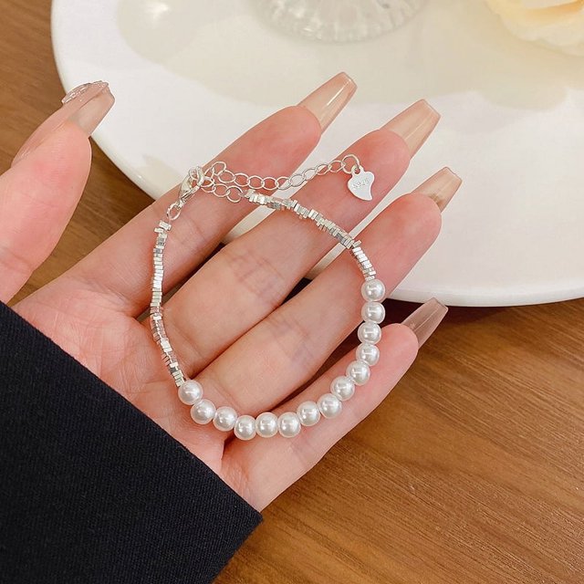 Pulsera de perlas vintage para mujer, pulsera de acero de titanio con nicho de sentido, pulsera para parejas, joyería