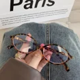 thumbnail image 1 of Y2K Lunettes Rétro Ovales Anti-Lumière Bleue Lunettes Noires et Blanches Vintage Simples pour Femmes Imprimé Léopard, 1 of 6
