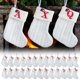 thumbnail image 1 of Medias Navideñas de Punto con Letras Bordadas Blancas para Niños: Decoraciones Festivas para Repisas, Árboles y Chimeneas (Juego de 1), 1 of 5