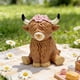 thumbnail image 1 of Figura de Vaca Sentada con Flor – Estatua de Animal de Granja de Resina para Decoración Del Hogar, Jardín, Estantería o Regalo de Estilo Rústico., 1 of 5
