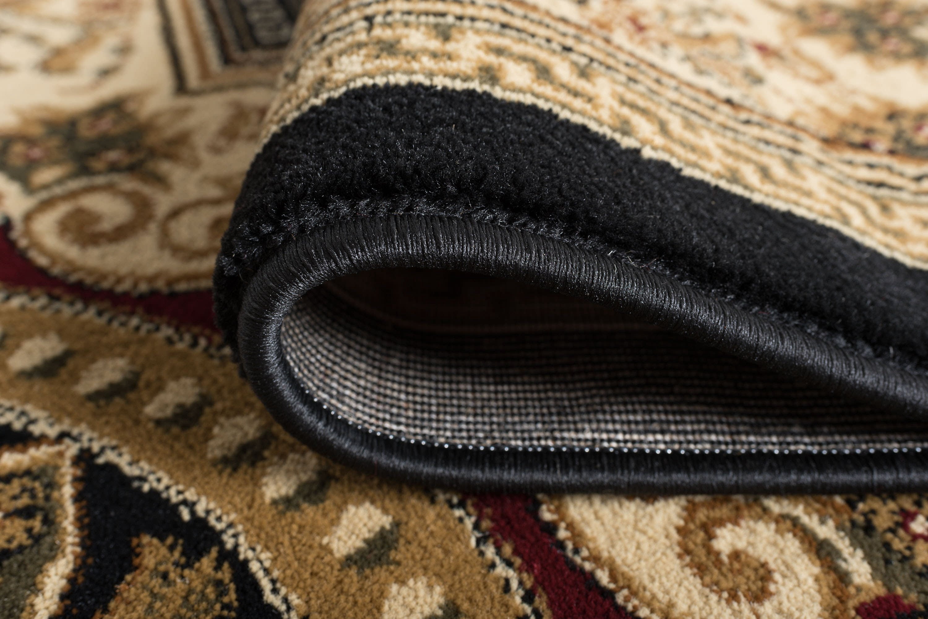 Sensation Traditional 2' x 7' Black and Beige Polypropylene Indoor Area Rug