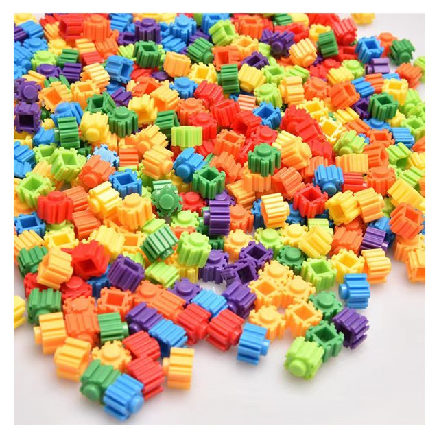 100g (aproximadamente 300 piezas) 10 mm pixel art puzzle micro diamond building blocks DIY 3D small brick para niños juguete educativo niños — montículo de microbloques plásticos de 10 mm en mezcla de colores al azar, vista cenital; piezas cilíndricas y cuadradas con conectores dentados y costillas moldeadas visibles, textura lisa sobre fondo blanco; a menudo usado para crear figuras pixeladas y proyectos educativos, recomendado para 14 años o más.