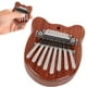 thumbnail image 1 of Mini piano de pulgar | Kalimba de 8 tonos | Instrumento musical portátil para principiantes | Instrumento de mano de madera maciza con teclas de acero | Incluye cordón para el cuello, 1 of 5