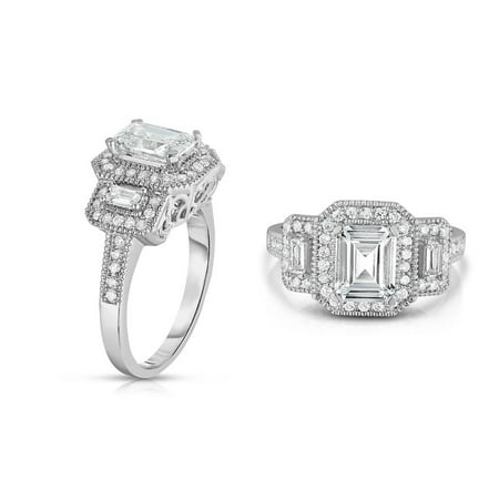- Tri Stone Emerald Cut Diamond Cut Ring in 18k White Gold