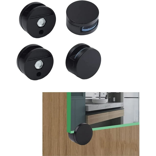 clips para espejo, clips de montaje para espejo, 4 soportes para espejo, soporte de pared para espejos de 3-5 mm de grosor (negro) Cuatro clips redondos negros de aleación de zinc de 27 mm × 13.5 mm con ranura de 6 mm y orificio para tornillo; primer plano de los accesorios y detalle de uno montado en la esquina inferior de un espejo sobre pared de madera, aptos para vidrio de 3–5 mm y también usados frecuentemente para fijar paneles de vidrio decorativos o placas ligeras.