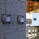 thumbnail image 3 of Moyic Luz de pared alimentada por energía Solar para valla, hogar, oficina, jardín, Patio, resistente al agua, lámpara de detección de carga de luz Iluminación y accesorios 2 bombillas blancas. Moyic HA064933-01B, 3 of 6