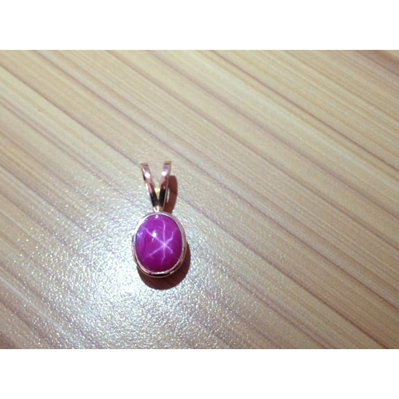 Lindi star ruby pendant in 14 solid gold