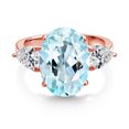 thumbnail image 2 of Gem Stone King 18K Rose Gold Plated Silver Sky Blue Topaz and Lab Grown Diamond Engagement Ring for Women | 7.22 Cttw | Oval 14X10MM | Gemstone November Birthstone | Size 5, 2 of 3