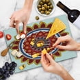 thumbnail image 4 of Mandala Cutting Board, Round with Leaves and Summer Meadow Daisies Sunflowers Colorful Joyous, Decorative Tempered Glass Cutting and Serving Board, Large Size, Multicolor, by Ambesonne, 4 of 5