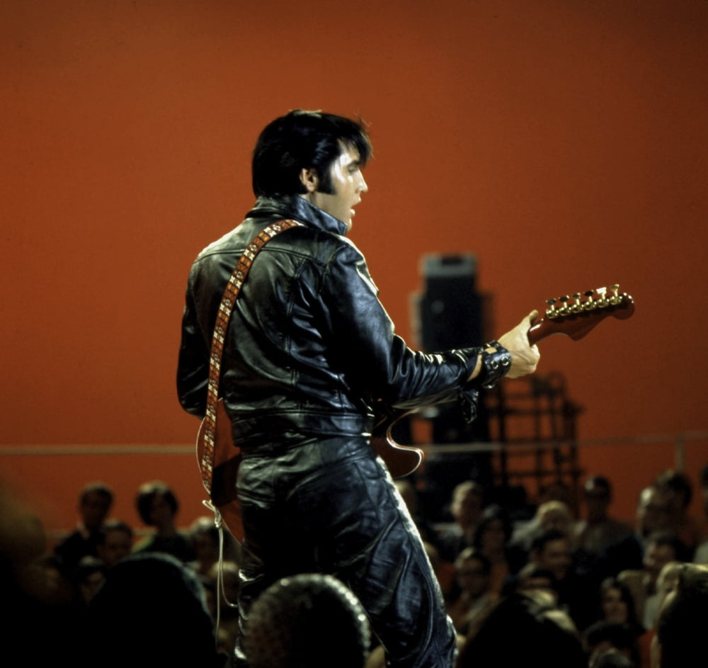 Elvis Presley performing in a leather jacket and pants Photo Print (30 x 24) - Walmart.com