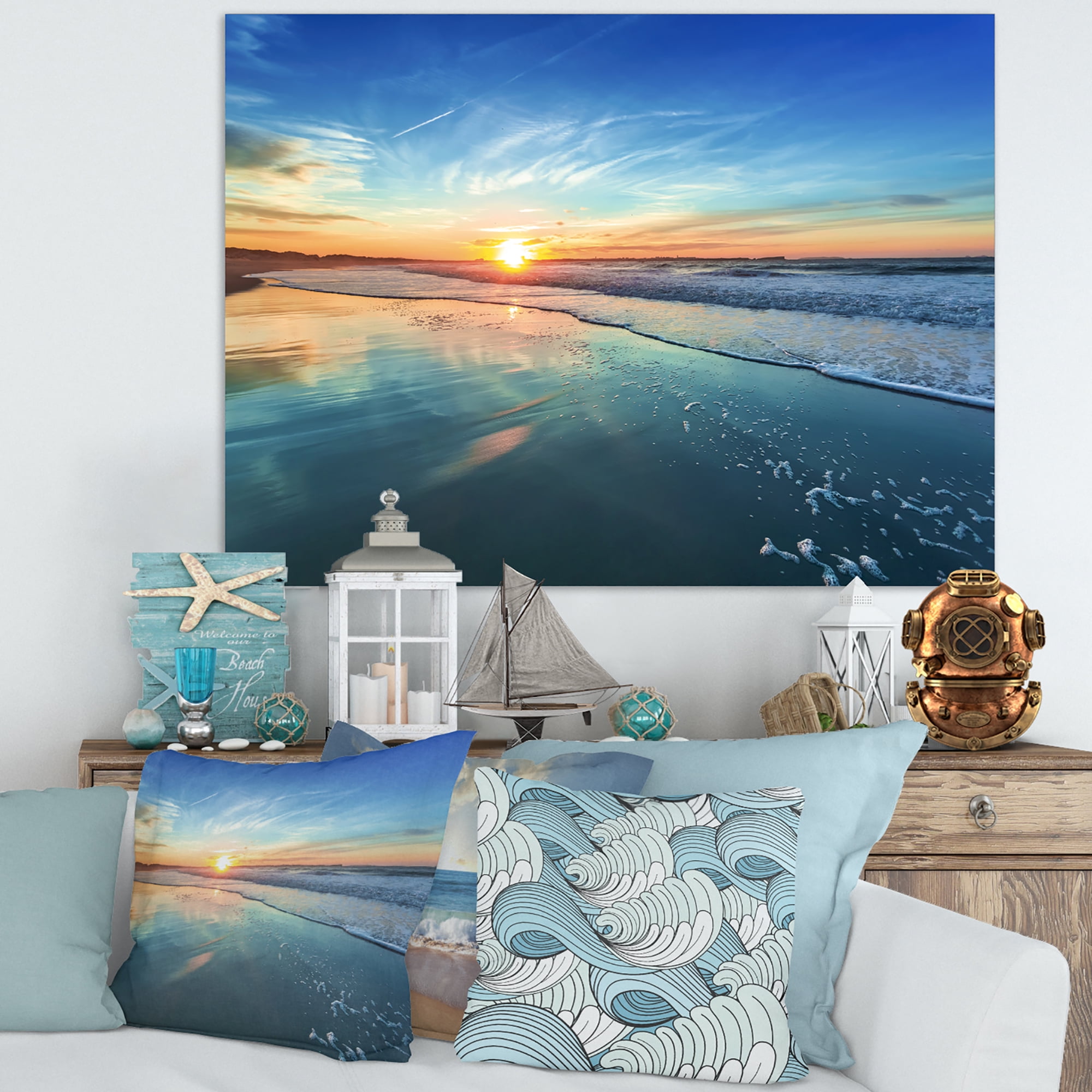 Designart 'Blue Seashore with Distant Sunset ' Seascape Canvas Art Print