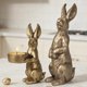 thumbnail image 1 of Set de figuras DN DECONATION con conejito de pascua dorado con candelita, 1 of 7