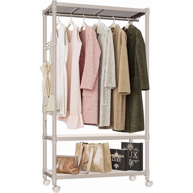 M MZG Heavy Duty Rolling Garment Rack Wire Clothes Rack for Hanging Clothes, Metal Closet Rack 3-Tier Clothing Rack in gold, measuring 17.7 inches deep, 33.5 inches wide, and 70.3 inches high. The rack features a sturdy carbon steel frame with adjustable shelves, a hanging rod, and side hooks for versatile storage. It includes 360° rotatable wheels for easy mobility and can support up to 750 pounds on feet or 300-350 pounds with wheels. The image shows the rack holding coats, dresses, and accessories, with additional storage for bags and boxes on the lower shelves.