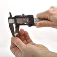 thumbnail image 1 of Regla de micrómetro de calibre de plástico de calibre a vernier digital electrónico LCD de 0-150 mm Tmvgtek Para estrenar, 1 of 9