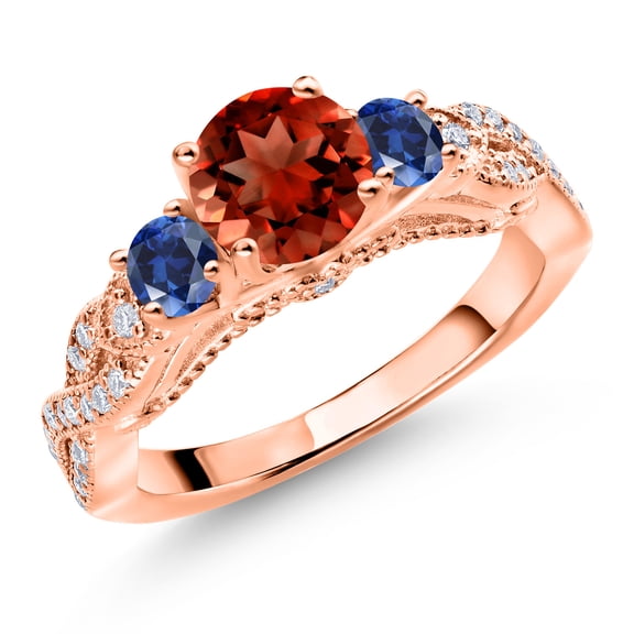 Gem Stone King 18K Rose Gold Plated Silver Red Garnet Blue Created Sapphire and White Moissanite Engagement Ring for Women (1.55 Cttw, Gemstone January Birthstone, Round 6MM and 3MM, Size 7)