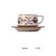 thumbnail image 2 of Juego de taza de café/té de cerámica vintage con diseño floral y platillo, 2 of 6