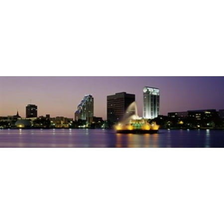 Fountain in a lake lit up at night Lake Eola Summerlin Park Orlando Orange County Florida USA Canvas Art - Panoramic Images (36 x
