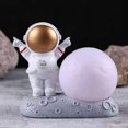 thumbnail image 1 of Taian Resina creativa Astronauta Luz nocturna Astronauta Modelo Adorno Mesita de noche Regalo creativo Soporte para teléfono móvil Lámpara para niños Lámpara - Golden Moo, 1 of 2