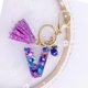 thumbnail image 3 of Llavero con letra A-z morada para mujer, bolso, bolso, colgante con letra inicial del alfabeto de resina con bola de cristal con borla, 3 of 3