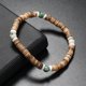 thumbnail image 1 of Nvzi Pulsera de cuentas de cáscara de coco hecha a mano para apilar, pulsera ajustable tejida trenzada hecha a mano -A, 1 of 4