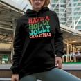 thumbnail image 2 of Have a Holly Jolly Christmas, Winter Season or Party Themed, Groovy Retro Wavy Text Merch Gift, Black Hooded Sweatshirt or Hoodie, Small, 2 of 5