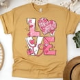 thumbnail image 1 of Nurse Love T-Shirt with Heart and Stethoscope Graphic, Gold, Size S, 1 of 6